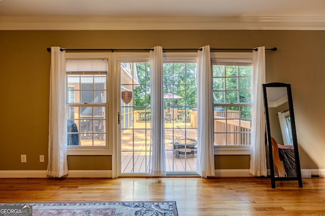 31 Bluff Mountain Dr SW, Rome, GA 30165 - doorway to outside featuring crown molding and wood finished floors