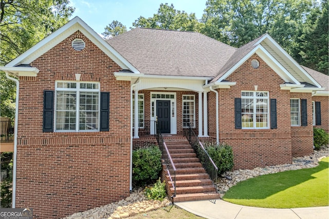 31 Bluff Mountain Dr SW, Rome, GA 30165 - view of front facade with brick siding and a shingled roof