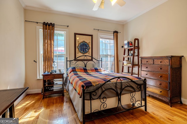 31 Bluff Mountain Dr SW, Rome, GA 30165 - bedroom with wood finished floors, multiple windows, crown molding, and a ceiling fan