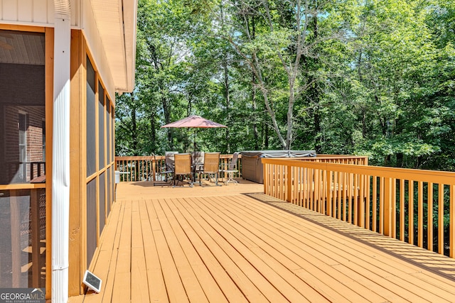 31 Bluff Mountain Dr SW, Rome, GA 30165 - wooden deck featuring a hot tub, outdoor dining space, and view of scattered trees