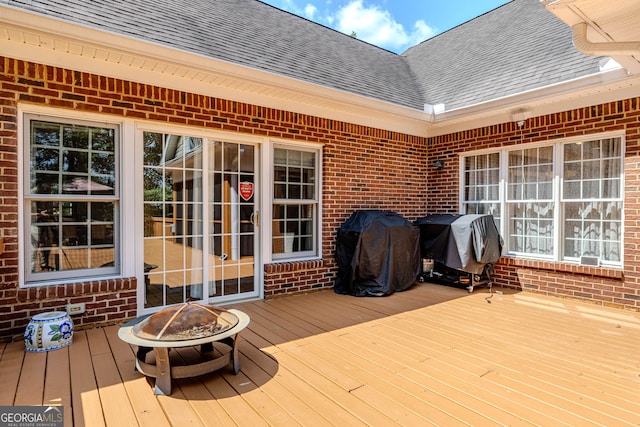 31 Bluff Mountain Dr SW, Rome, GA 30165 - wooden deck with an outdoor fire pit and area for grilling
