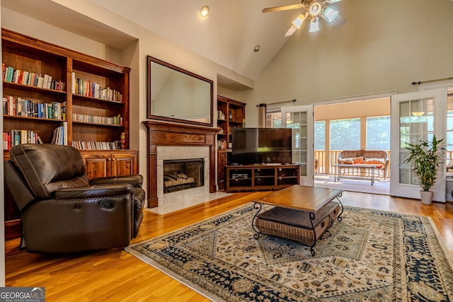31 Bluff Mountain Dr SW, Rome, GA 30165 - living room featuring ceiling fan, high vaulted ceiling, a fireplace, wood finished floors, and recessed lighting