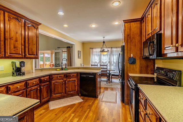 31 Bluff Mountain Dr SW, Rome, GA 30165 - kitchen featuring black appliances, crown molding, light wood-type flooring, recessed lighting, and a peninsula