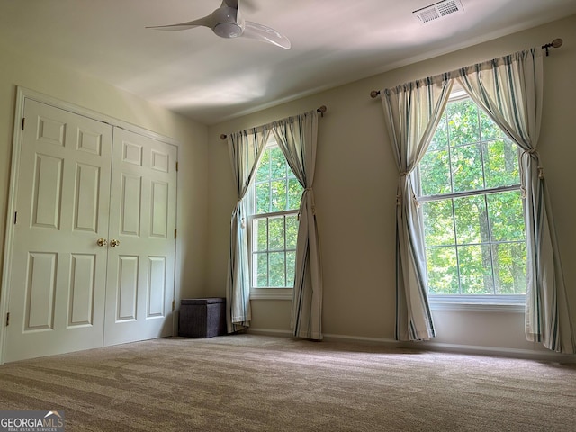 2355 Brick Mill Ct, Duluth, GA 30096 - carpeted spare room featuring a ceiling fan and baseboards