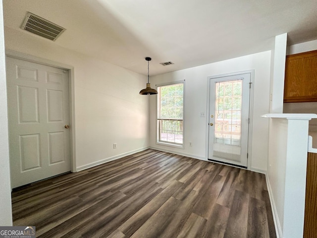 2355 Brick Mill Ct, Duluth, GA 30096 - unfurnished dining area featuring dark wood finished floors and baseboards