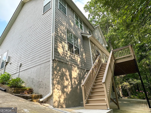 2355 Brick Mill Ct, Duluth, GA 30096 - view of side of property featuring stairway and a wooden deck