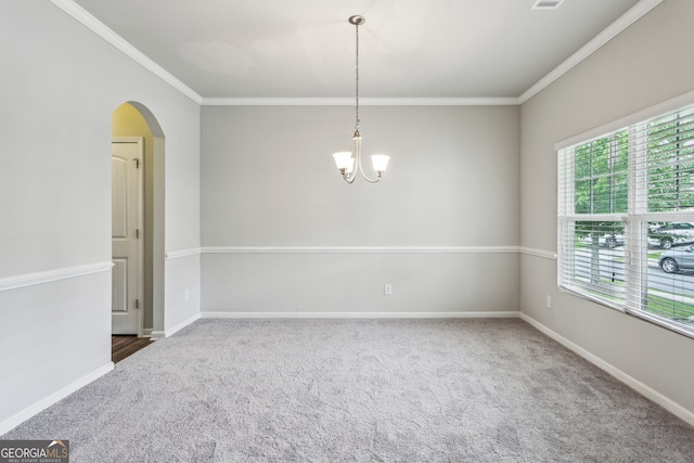 98 Concord Pl, Hiram, GA 30141 - carpeted empty room featuring ornamental molding, arched walkways, and a chandelier