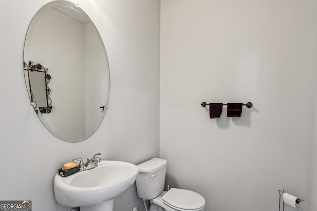 98 Concord Pl, Hiram, GA 30141 - half bathroom featuring a sink and toilet