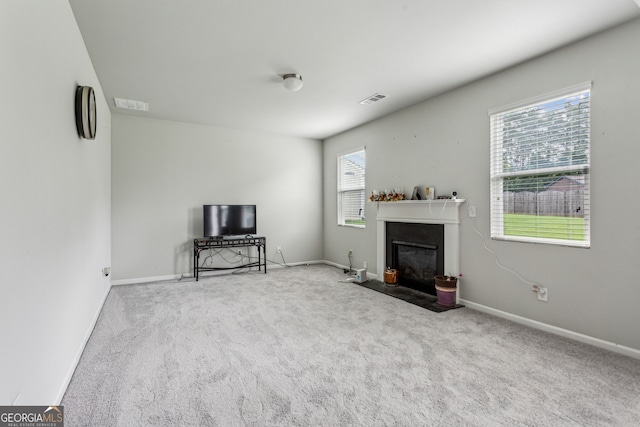 98 Concord Pl, Hiram, GA 30141 - living room featuring carpet floors and a fireplace with flush hearth