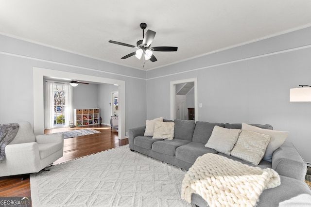 209 Athens St, Jefferson, GA 30549 - living room featuring wood finished floors, a ceiling fan, and ornamental molding