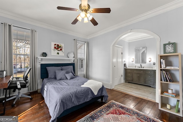 209 Athens St, Jefferson, GA 30549 - bedroom featuring wood-type flooring, multiple windows, arched walkways, crown molding, and ensuite bathroom