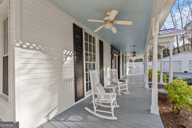209 Athens St, Jefferson, GA 30549 - porch with a ceiling fan and an outbuilding