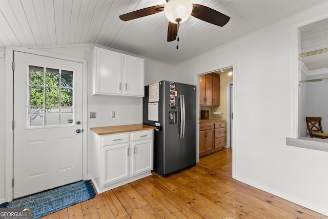 209 Athens St, Jefferson, GA 30549 - kitchen featuring refrigerator with ice dispenser, light wood-style flooring, white cabinets, ceiling fan, and wooden counters