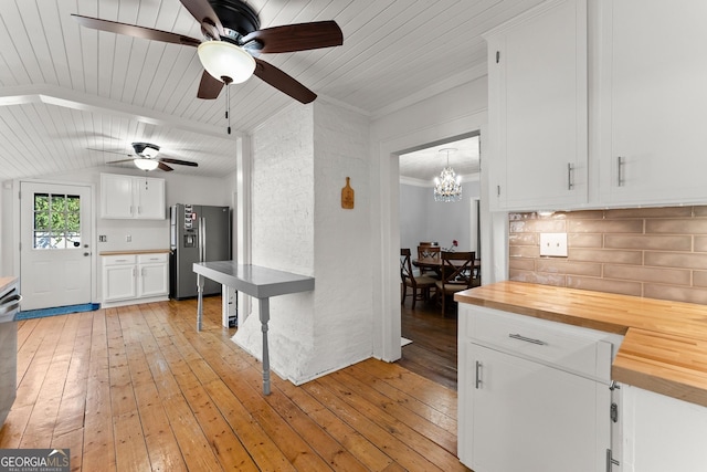 209 Athens St, Jefferson, GA 30549 - kitchen featuring stainless steel fridge, ceiling fan, butcher block counters, light wood-type flooring, and wooden ceiling
