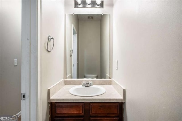 11151 Aliyah Dr, Hampton, GA 30228 - bathroom with vanity and toilet