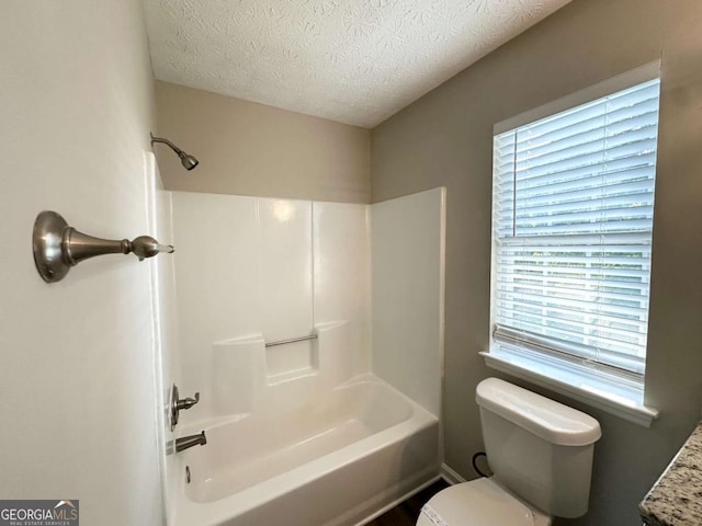 4320 Catalpa Way, Ellenwood, GA 30294 - bathroom with toilet, shower / washtub combination, a textured ceiling, and vanity