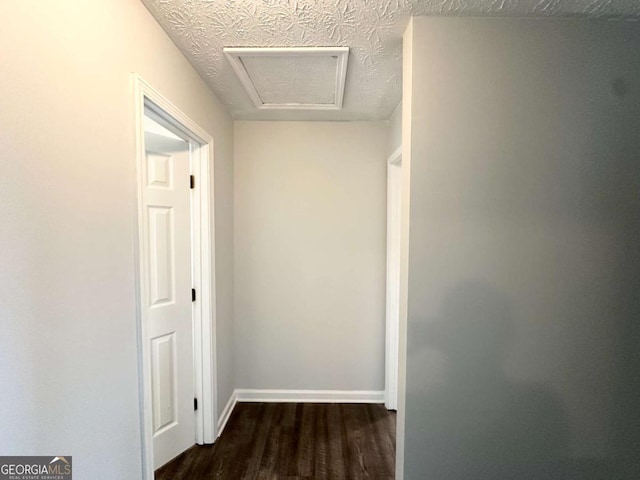 4320 Catalpa Way, Ellenwood, GA 30294 - hallway featuring wood finished floors, attic access, and baseboards