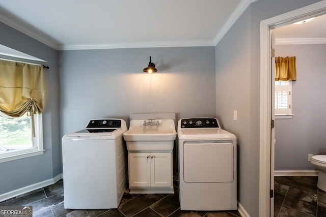 3548 Liberty Ln, Marietta, GA 30062 - laundry room with crown molding and washing machine and dryer