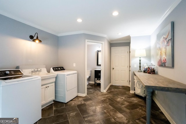 3548 Liberty Ln, Marietta, GA 30062 - washroom with ornamental molding, cabinet space, washing machine and clothes dryer, and recessed lighting