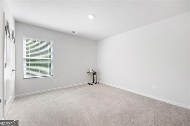 312 Deer Run Dr, Dallas, GA 30132 - carpeted spare room featuring baseboards