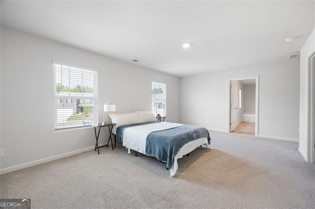312 Deer Run Dr, Dallas, GA 30132 - carpeted bedroom featuring baseboards, recessed lighting, and connected bathroom