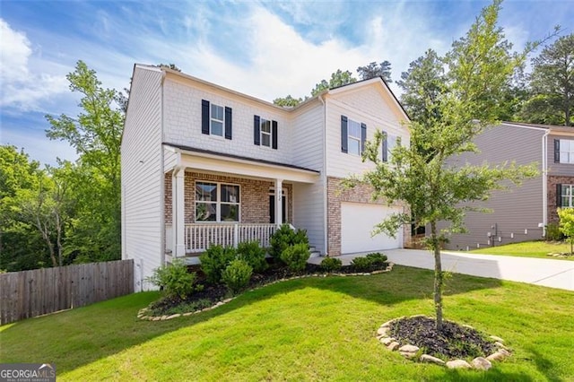 312 Deer Run Dr, Dallas, GA 30132 - view of front of house with a garage, a porch, brick siding, and driveway