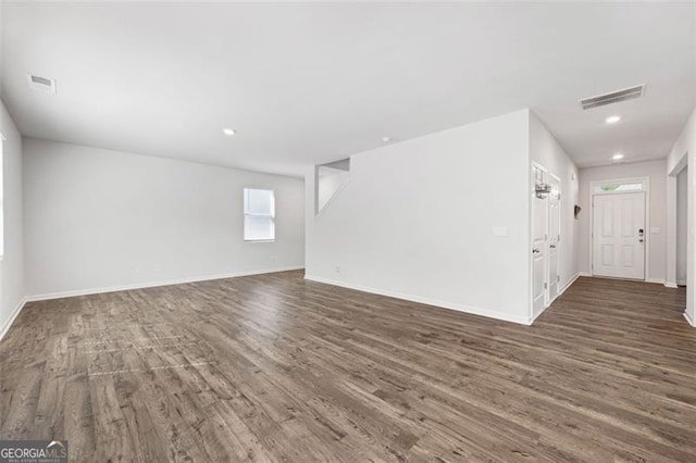 312 Deer Run Dr, Dallas, GA 30132 - unfurnished living room featuring wood finished floors and recessed lighting