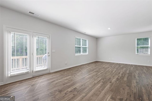 312 Deer Run Dr, Dallas, GA 30132 - empty room with wood finished floors and baseboards