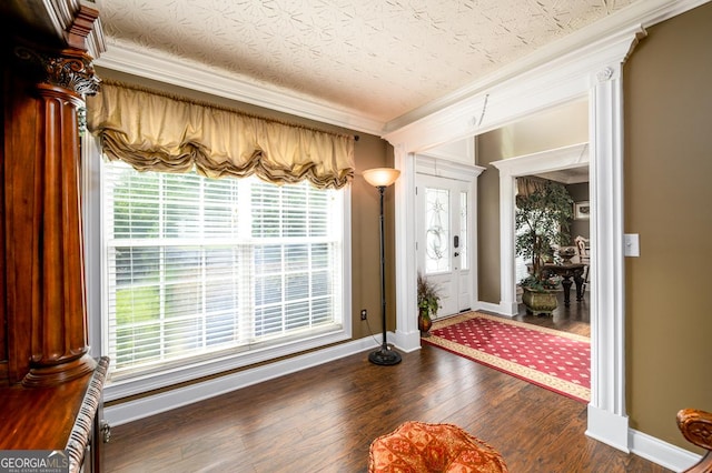 7282 Litany Ct, Flowery Branch, GA 30542 - foyer featuring crown molding and wood finished floors