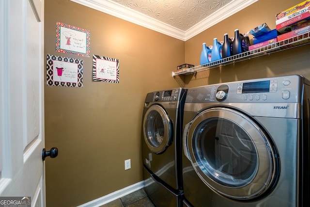 7282 Litany Ct, Flowery Branch, GA 30542 - laundry area featuring washing machine and clothes dryer, an ornate ceiling, and ornamental molding
