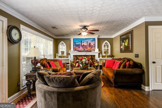 7282 Litany Ct, Flowery Branch, GA 30542 - living area featuring a ceiling fan, wood finished floors, and ornamental molding