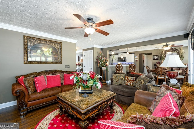 7282 Litany Ct, Flowery Branch, GA 30542 - living room featuring ceiling fan, wood finished floors, and ornamental molding