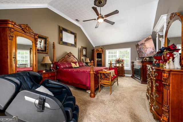 7282 Litany Ct, Flowery Branch, GA 30542 - bedroom featuring carpet, multiple windows, lofted ceiling, a fireplace, and crown molding