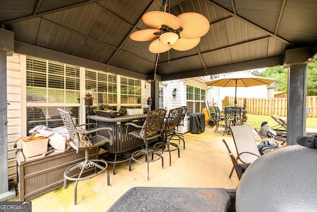 7282 Litany Ct, Flowery Branch, GA 30542 - view of patio with outdoor dining space, a ceiling fan, and a gazebo