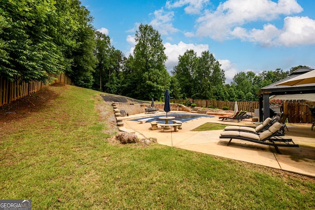 7282 Litany Ct, Flowery Branch, GA 30542 - fenced backyard featuring a gazebo and a patio