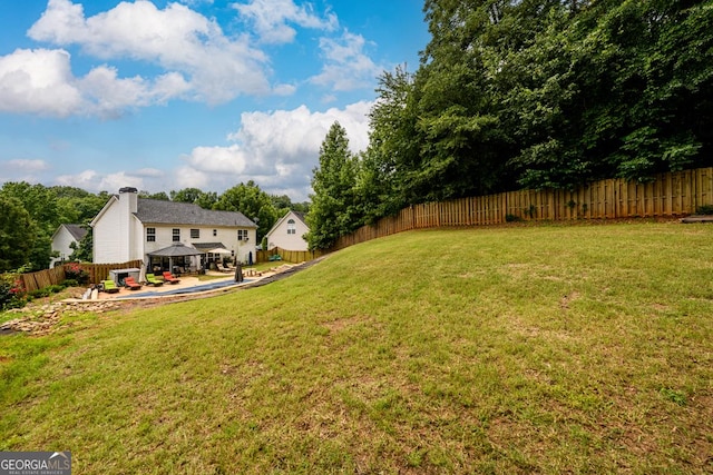 7282 Litany Ct, Flowery Branch, GA 30542 - fenced backyard featuring a gazebo and a patio