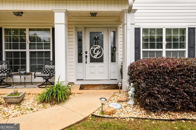 7282 Litany Ct, Flowery Branch, GA 30542 - view of exterior entry with covered porch