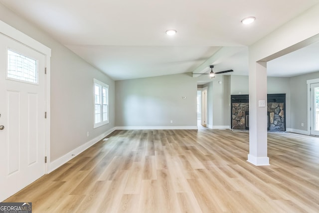 262 Gray Hwy, Gordon, GA 31031 - unfurnished living room featuring healthy amount of natural light, baseboards, light wood-style floors, recessed lighting, and vaulted ceiling