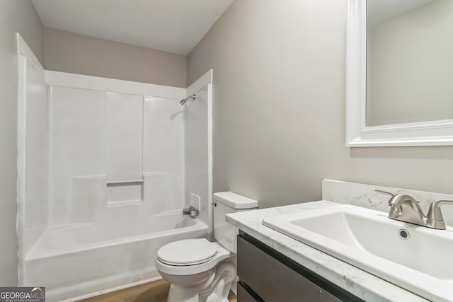 262 Gray Hwy, Gordon, GA 31031 - bathroom featuring vanity, toilet, and shower / washtub combination