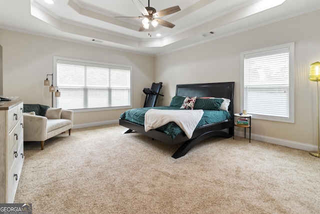 152 Jackson Dr, Forsyth, GA 31029 - carpeted bedroom featuring ornamental molding, a tray ceiling, baseboards, recessed lighting, and ceiling fan