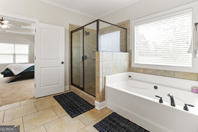 152 Jackson Dr, Forsyth, GA 31029 - ensuite bathroom with a bath, a stall shower, healthy amount of natural light, ornamental molding, and tile patterned flooring