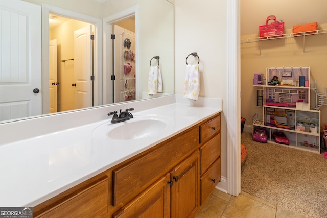 152 Jackson Dr, Forsyth, GA 31029 - bathroom featuring vanity and tile patterned flooring