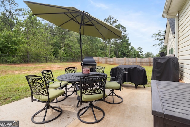 152 Jackson Dr, Forsyth, GA 31029 - view of patio featuring outdoor dining space and area for grilling