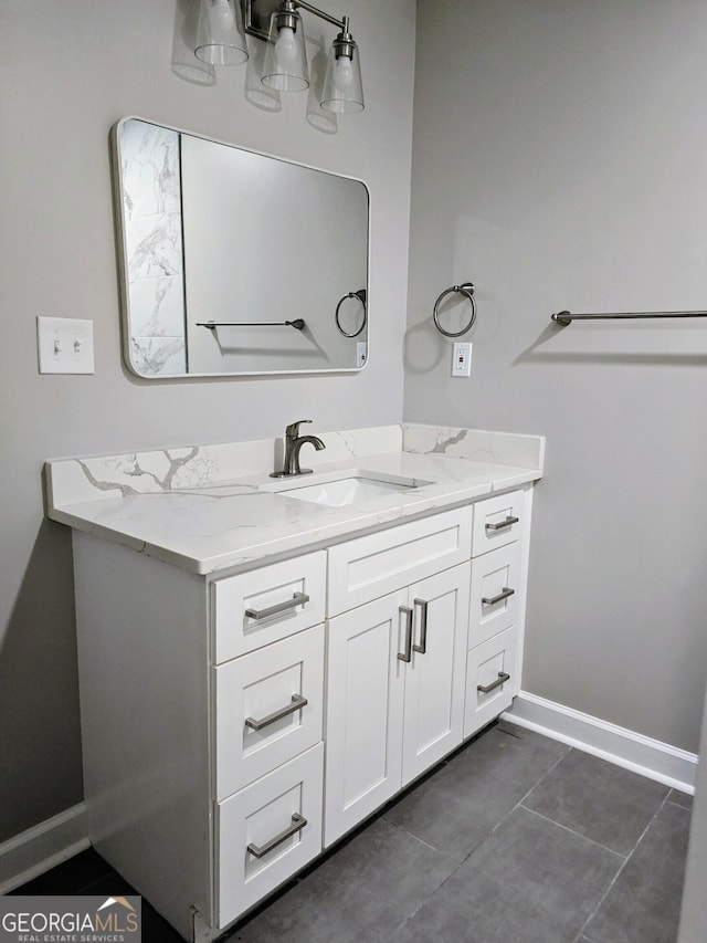 5425 Herndon Blvd, Morrow, GA 30260 - bathroom featuring vanity, baseboards, and tile patterned floors