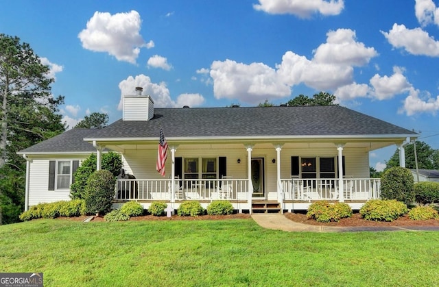 3265 Bold Springs Rd, Dacula, GA 30019 - view of front of house featuring covered porch, a chimney, and a front yard