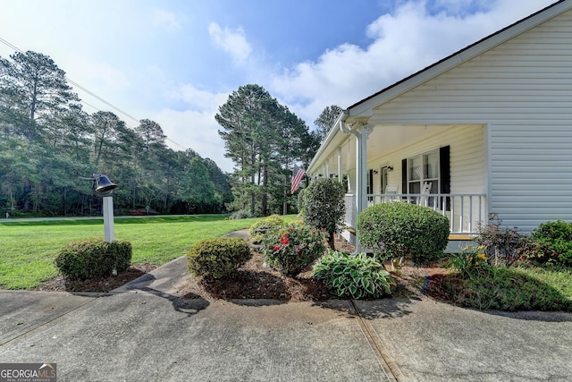 3265 Bold Springs Rd, Dacula, GA 30019 - view of home's exterior featuring a yard and a porch