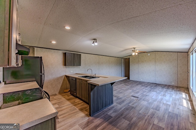 461 Mccord Rd, East Dublin, GA 31027 - kitchen featuring a peninsula, a sink, freestanding refrigerator, a ceiling fan, and dishwasher