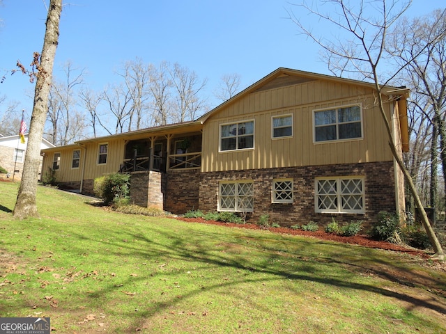 141 Cherokee Cir, Cedartown, GA 30125 - view of front of home with brick siding and a front yard