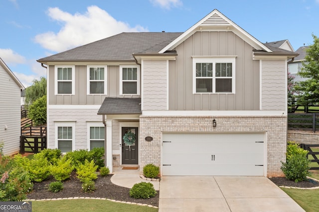 306 Coppergate Ct, Holly Springs, GA 30115 - view of front facade featuring board and batten siding, a garage, driveway, and brick siding