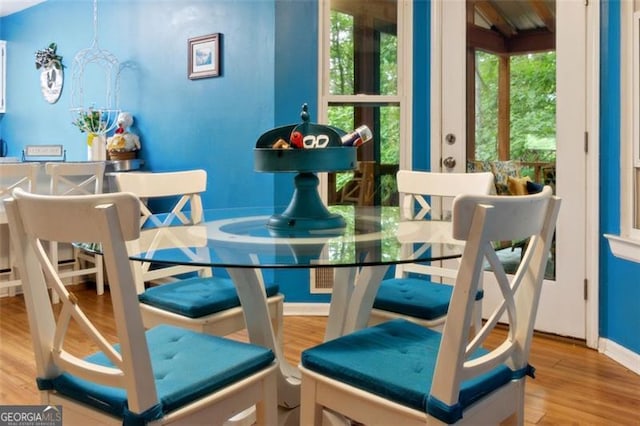 141 Mills Creek Path, Hiram, GA 30141 - dining space with wood finished floors and baseboards